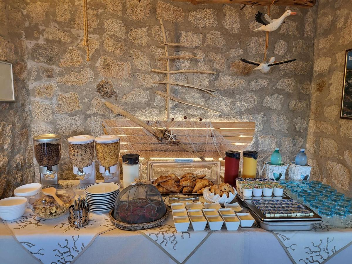 Hotel Olimpia Baja Sardinia Luaran gambar